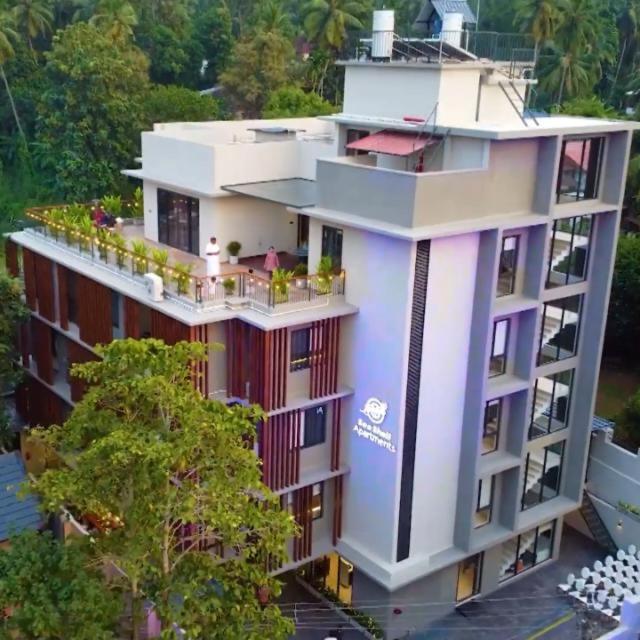 Seashell Apartments Кожикод Екстериор снимка